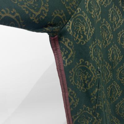 Sasquatchfabrix. [ “CURLED UP DRAGON” TRACK JACKET ] DARK GREEN